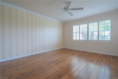 Spacious Master Bedroom has easy care wood floors 
