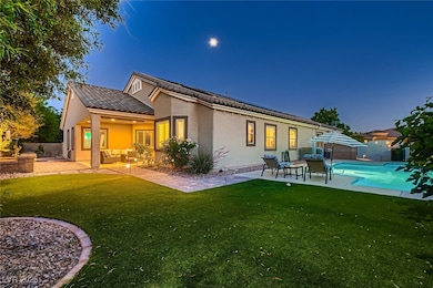 Rear view of house featuring outdoor lounge area,