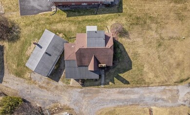 Overhead view shows the large 3 car detached garag