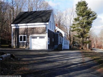 Paved driveway and one car attached...