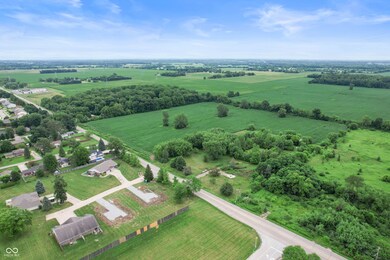 aerial view of sparsely populated area with agricultural land