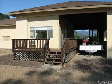 Front  of living space on front of garage next to 