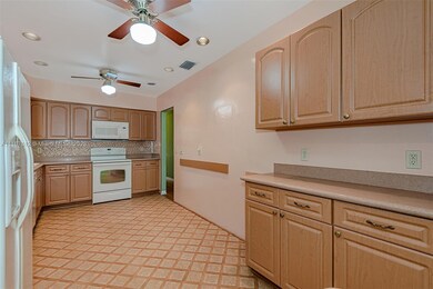 Another view showing additional cabinets & counter