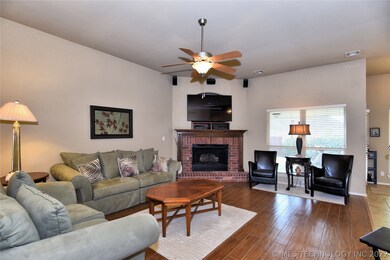 Great room has new wood-look tile flooring for eas