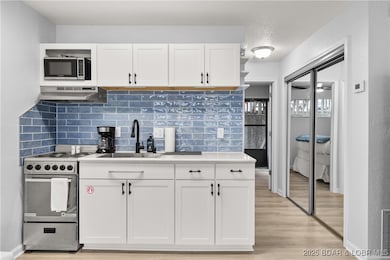 Recently updated kitchen with new appliances, tile
