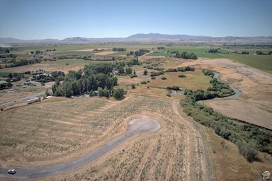 Aerial view of sparsely populated area with a mountain backdrop