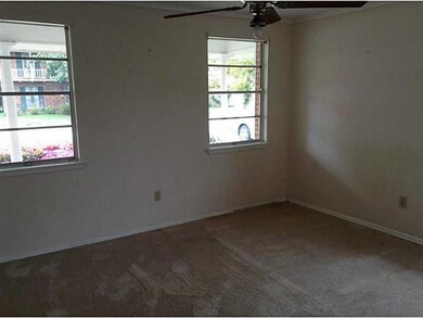 Bedroom. Bedroom 1 with front yard view.