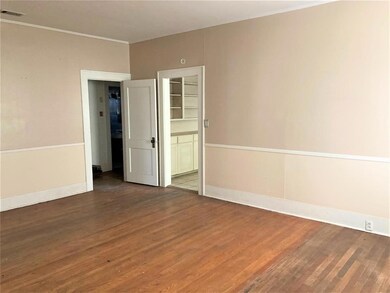 Another view of dining room with doorways to kitch