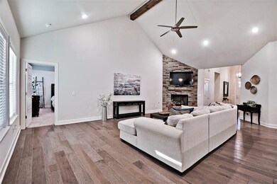 Vaulted ceilings and open concept layout creates a