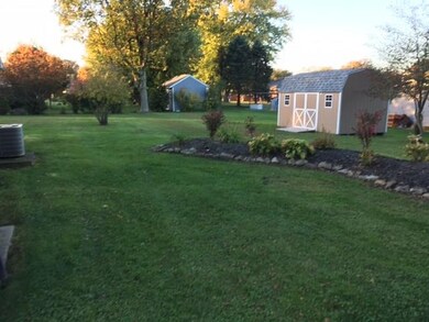 Spacious level backyard.