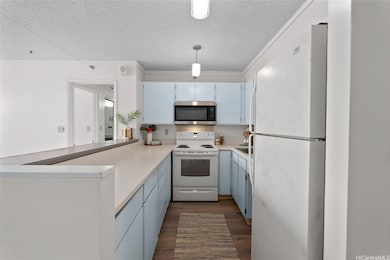 This galley-style kitchen offers generous counter