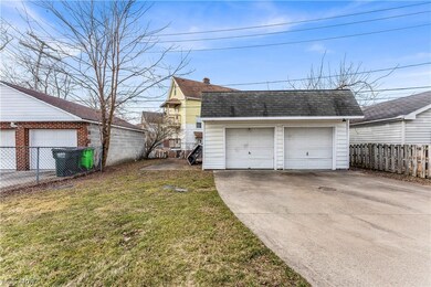 Garage featuring a yard