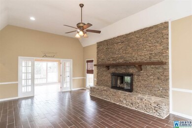 Huge stacked stone fireplace which was converted t