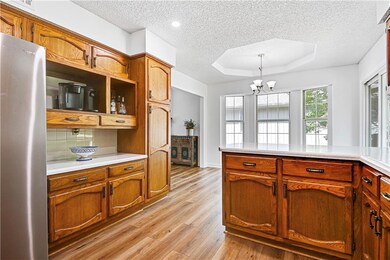 205 N Darrowby Dr, Raymore, MO 64083 - photo 7