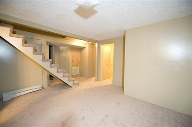 The laundry hook-ups are off this basement family 