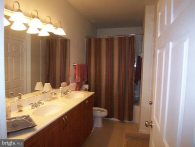 12909 Centre Park Cir unit 404, Oak Hill, VA 20171 - photo 2