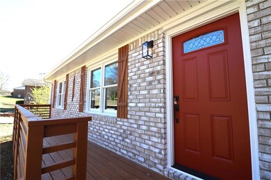 Property entrance with brick siding