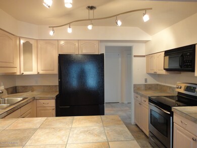 Tile countertops updated kitchen