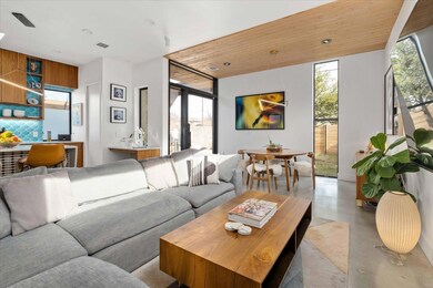 Living room with finished concrete flooring