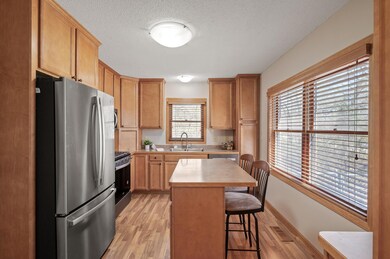 Stainless appliances with gas range.