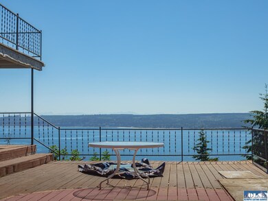Relax on the deck and soak in the expansive water 