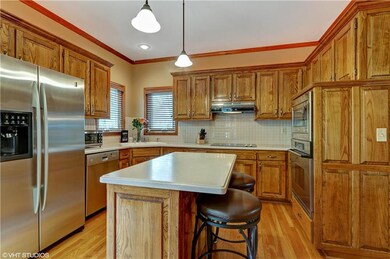 New Lighting and hardware in Spacious Kitchen