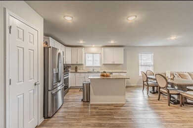 Kitchen featuring a sink, stainless steel applianc