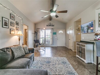 A spacious and versatile living space offers tile 
