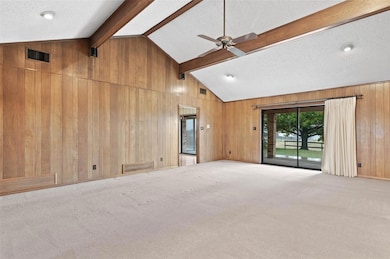 Enjoy the views from this warm family room!