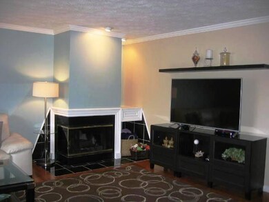 Living Room with Fireplace - A fireplace corner ha