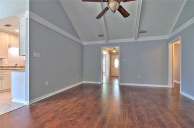 Great Room/Den.  Foyer in the background & entranc