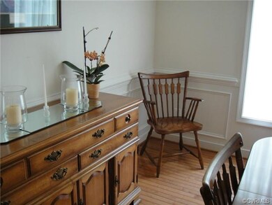 Dining Room showing hardwoods, picture frame mould
