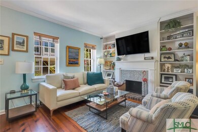 Built-in bookcases surrounding a fireplace.
