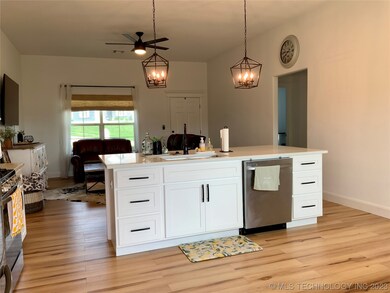 Island with sink and lots of prep area.