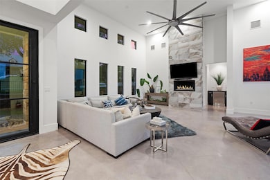 Living room featuring a towering ceiling, ceiling