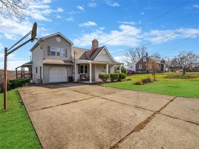 Spacious driveway with ample parking, complemented