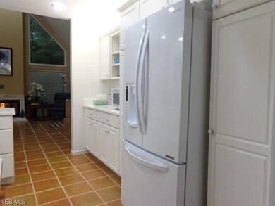 View of kitchen refrigerator.