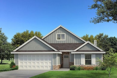 Craftsman inspired home with a garage, concrete dr