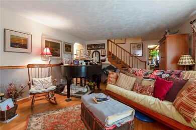 Living Room with Staircase leading to Second Level