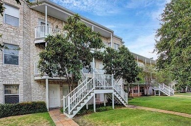 View of property featuring stairs