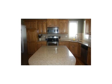 Island area, pantry and granite countertops
