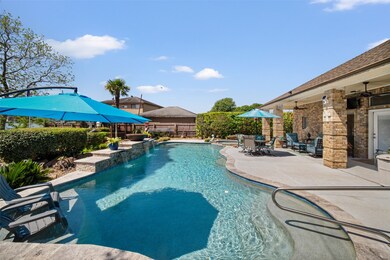 The sparkling pool, complete with tranquil waterfa