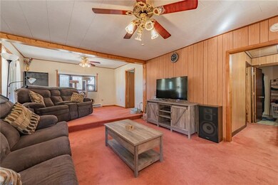 The living room is the hub for this raised ranch, 