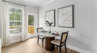 Dining space with light wood-type flooring and cro
