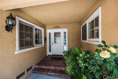 Inviting front porch welcomes you in to this home.