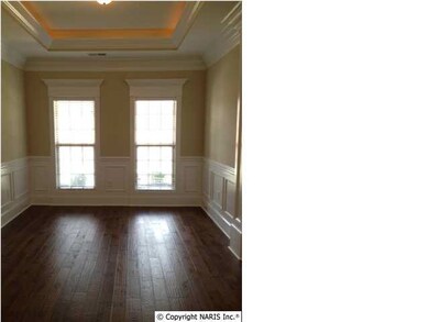 Dining room with amazing floors, treyed ceiling with rope lighting