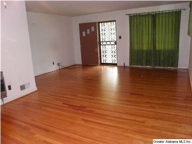 The hardwood floors have just been refinished and 