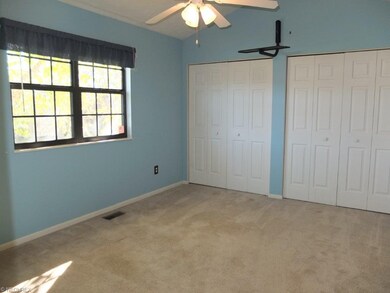 Master bedroom on the main level with double close