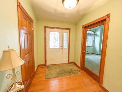 coat closet on left, office on right