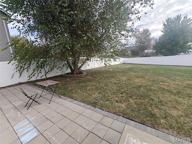 Fenced backyard featuring a patio area